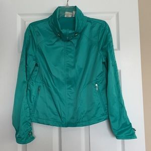 NWOT Chico, jacket, green or teal a mixture of both. Excellent condition.